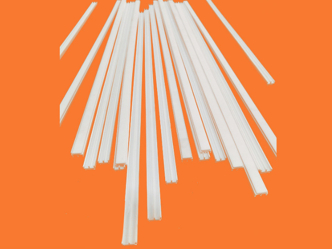Supply PTFE slide strips, machined F4 long strips with milled grooves and guide fins
